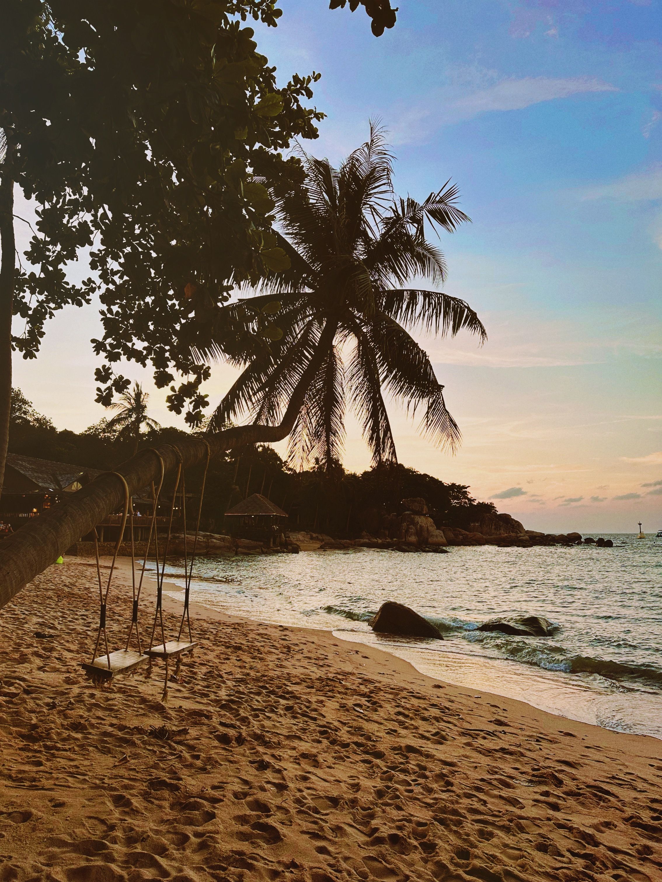 Beach swing at golden hour outside Carabao Diving Resort, Chalok Bay