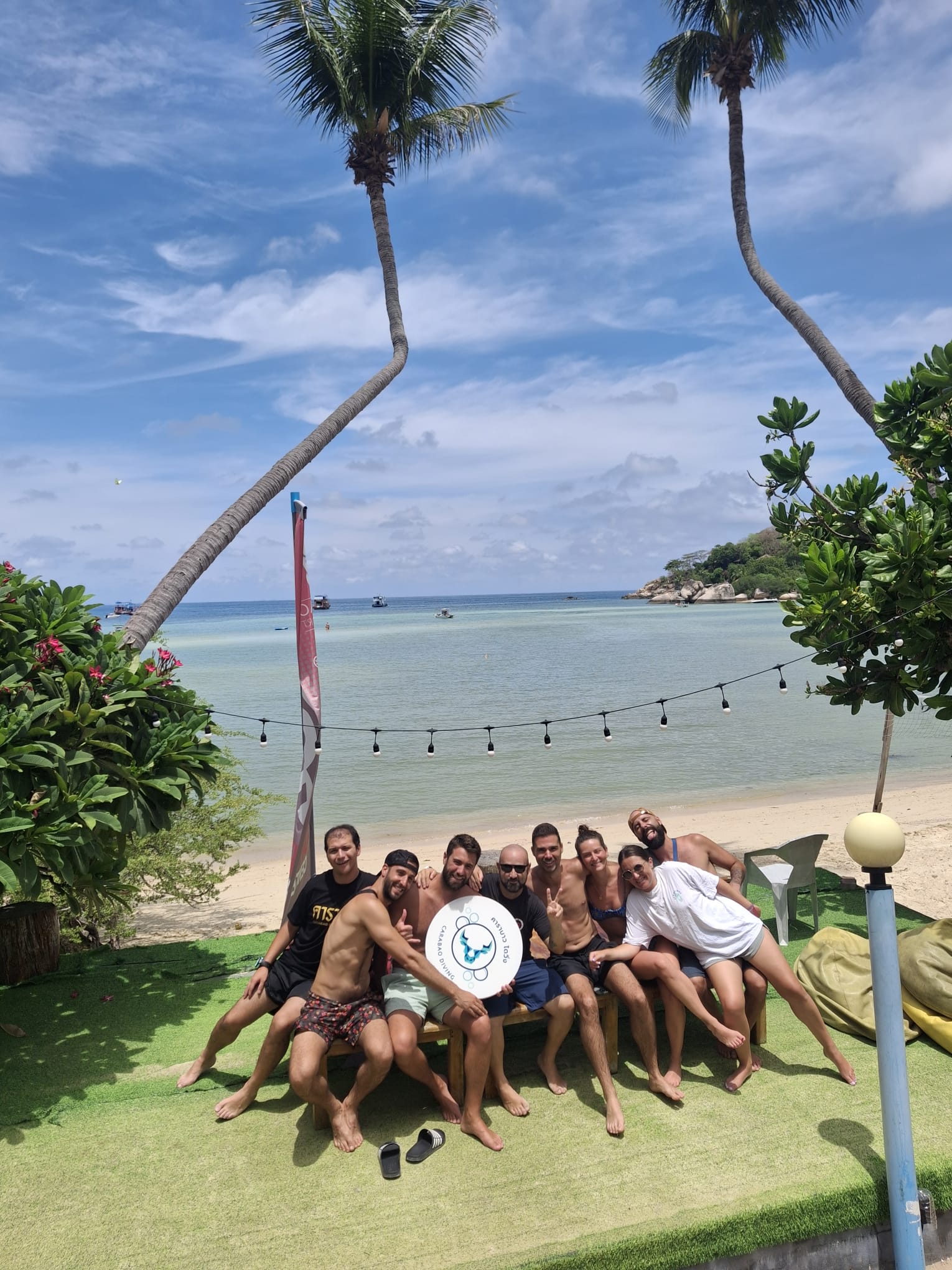 The Carabao crew and divers together on the beach in Chalok Bay, Koh Tao